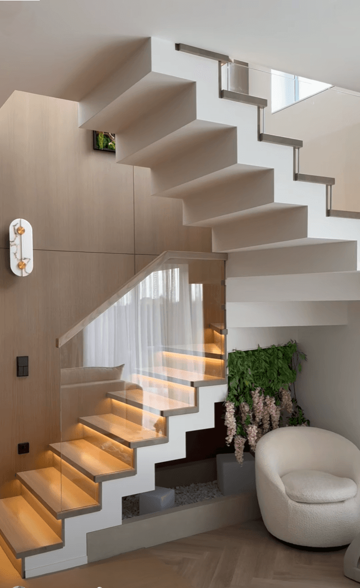 Concrete-clad staircase — wood, glass & LED