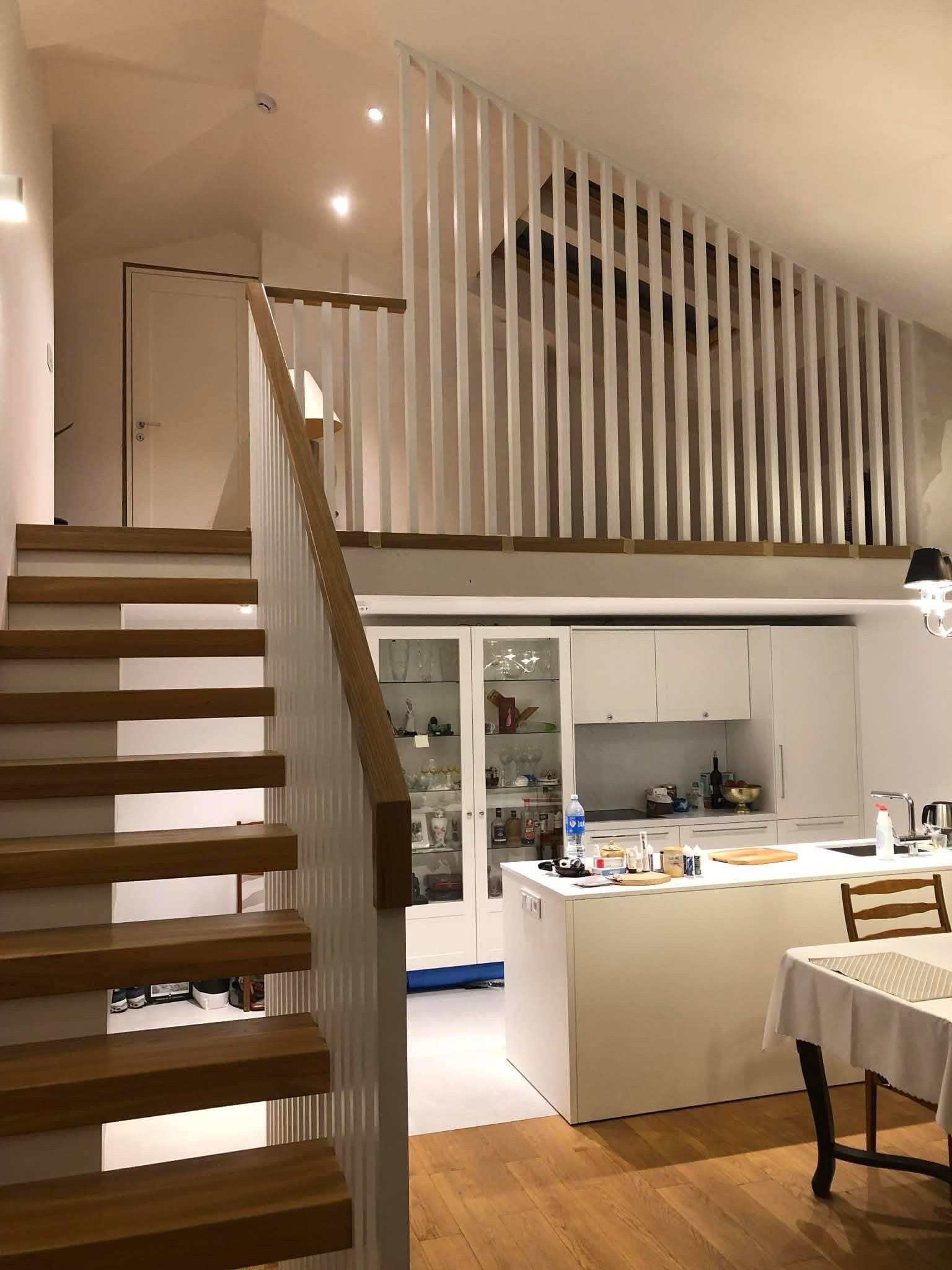Loft staircase — white slat railing