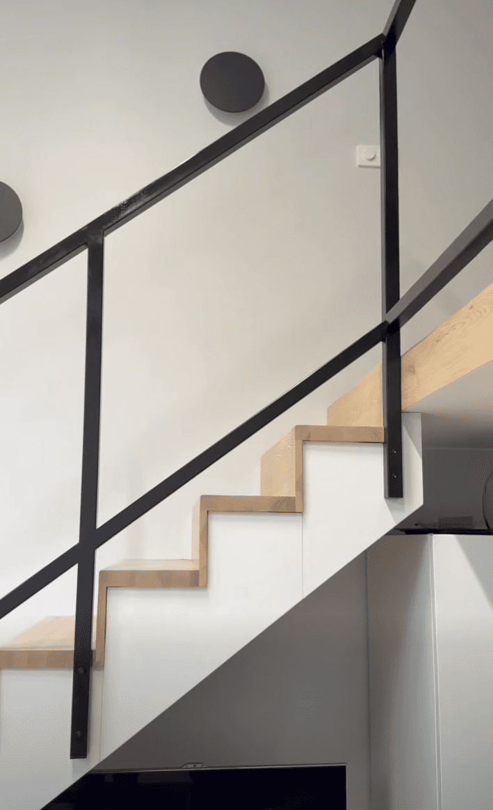 Loft staircase — steel structure & black railing