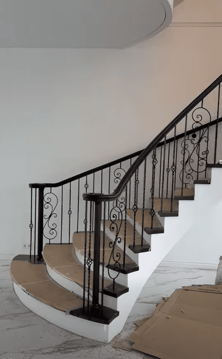 Classic curved staircase — ironwork